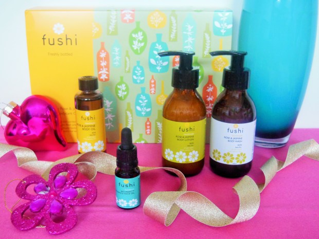 Fushi Rose and Jasmine Gift Set groupshot with Christmas decorations