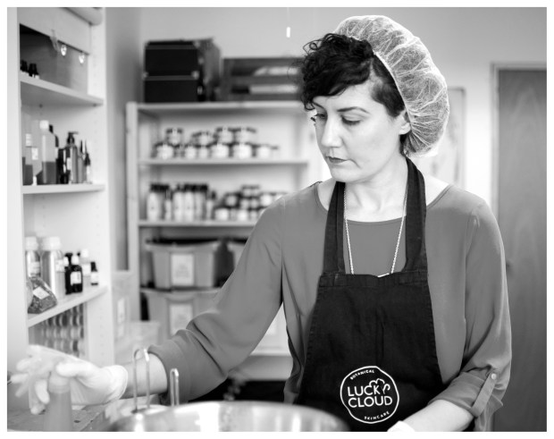 Lucy Cardwell working on Lucky Cloud Skincare formulations