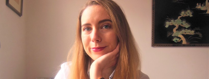 Portrait with Chinese painting in the background