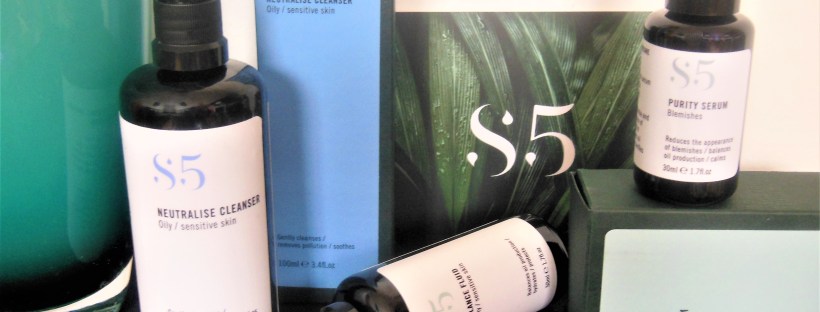 Three black pump dispensers from the S5 skincare range