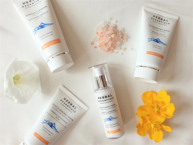 Himalayan Spring Water skincare products with flowers