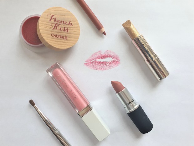 Lipstick, lipgloss and lipbalm with kiss