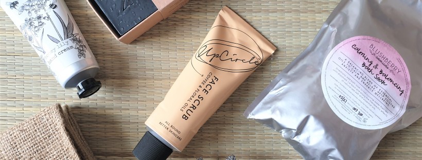 Natural skincare products on a rattan mat