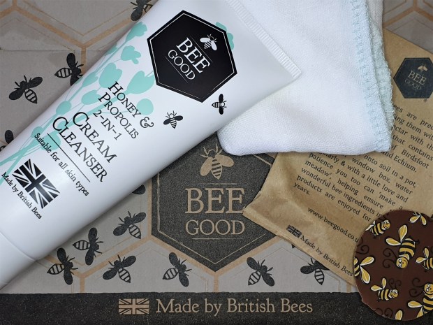 Bee Good Cream Cleanser tube on bee printed cardboard