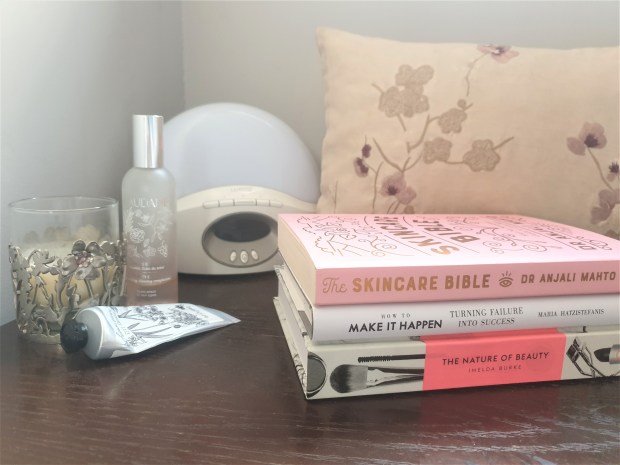 Beauty books on a bedside table